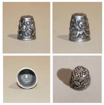 Напёрсток "Ангелочки". Серебро по реактиву. Конец XIX - начало ХХ века.