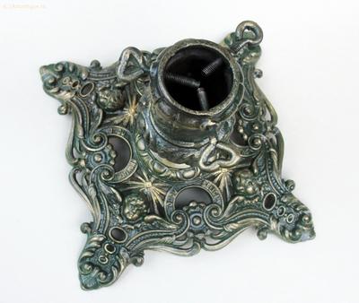 Подставка для новогодней елки "Ангелочки". Предмет опубликован в немецком каталоге. Конец XIX века.